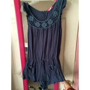 Blue romper with floral collar design