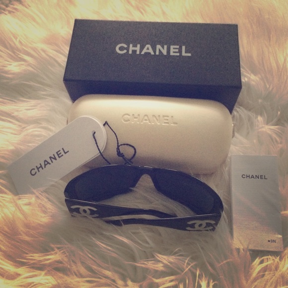Authentic Chanel mother of pearl black sunglasses.