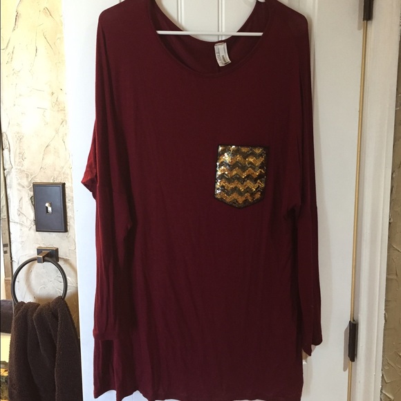 Long sleeved tunic with sequin pocket