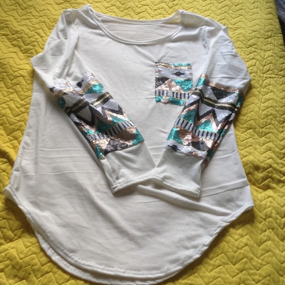 White top long sleeve with Aztec sequined print.