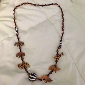 Hand carved wooden animal necklace from Africa
