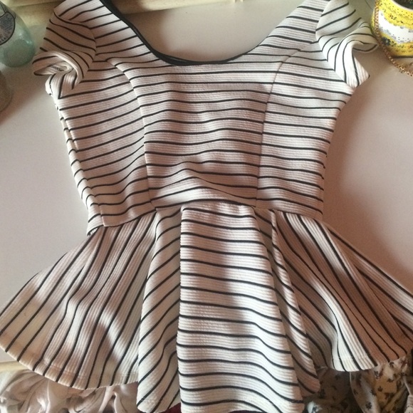 Dainty striped blouse .