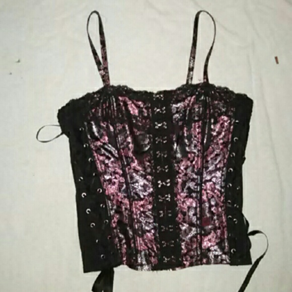 Corset with sliver dragon print and flowers.