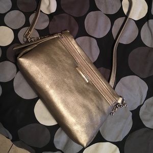 Brand new 9W cross body in gold!