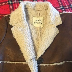 Retro Woodstock festival style faux shearling coat