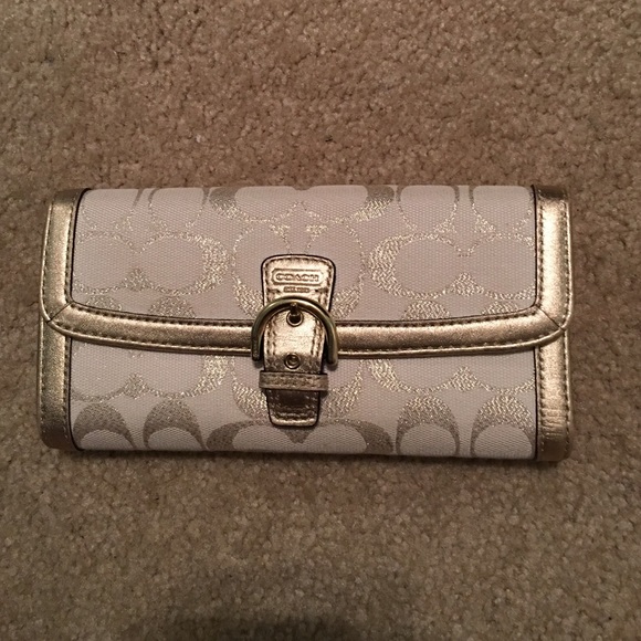 Gold and white COACH wallet