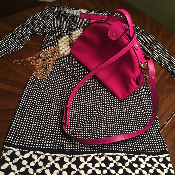 Swing into spring with this pink Kate Spade purse.