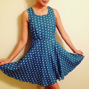 Polka Dot Dress with Open cuts in the back .