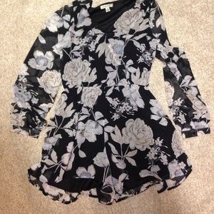 Long sleeve black & cream romper.