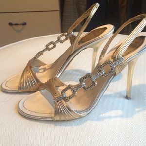 Gold and silver sling backs