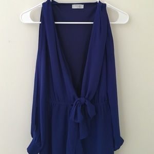Royal blue romper with deep v neckline
