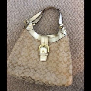 Gold coach purse