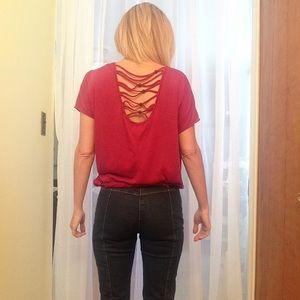 Wine colored top w crisscrossing back w beads