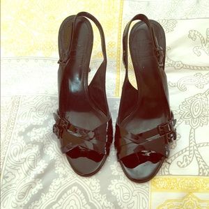 Black criss cross buckle peep toes