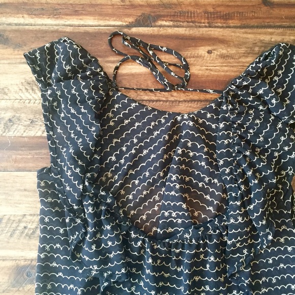 Flirty and Flattering scoop back sheer tie top