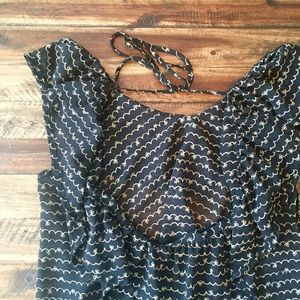 Flirty and Flattering scoop back sheer tie top