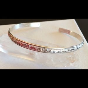 Sterling silver cuff bracelet.