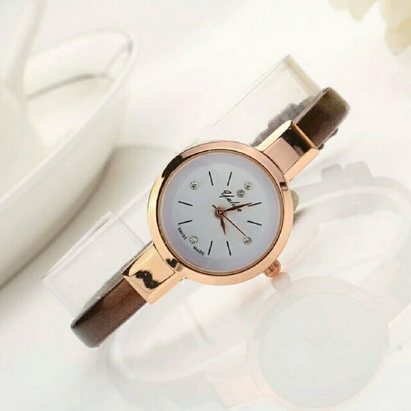 Brown band bracelet watch