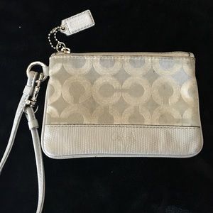 Silver and grey coach wristlet