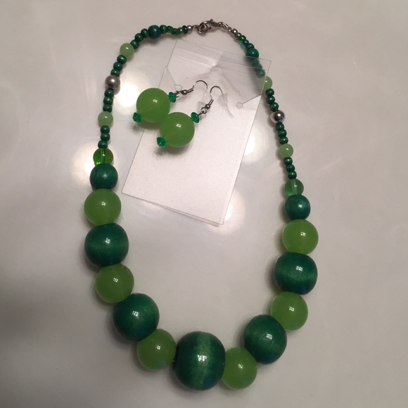 Wood and acrylic beaded necklace with earrings.