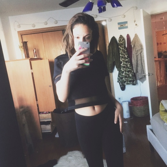 Black crop top with mesh bottom and sleeves