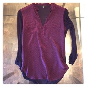Babaton silk blouse with navy blue sheer back.