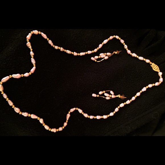 Fresh water pink pearl necklace and earring set.