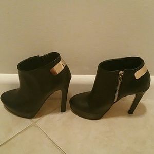 Black ankle boots with side zippers
