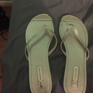 Pair of silver shiny sandals
