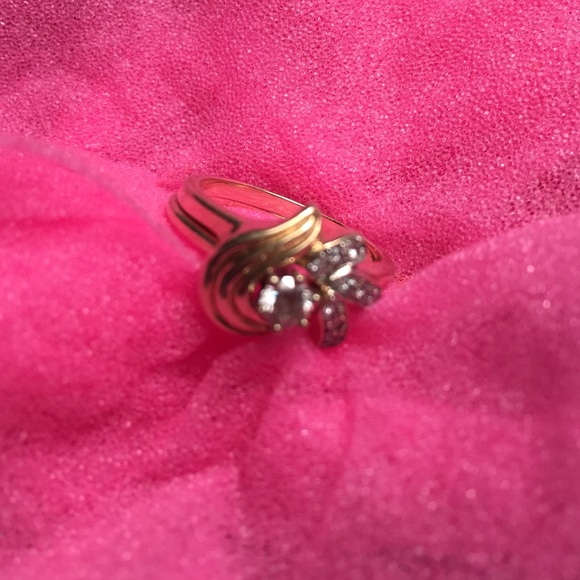 Diamond solitaire with custom designed wrap.
