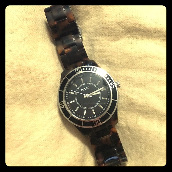 Fossil tortoise shell watch with black face