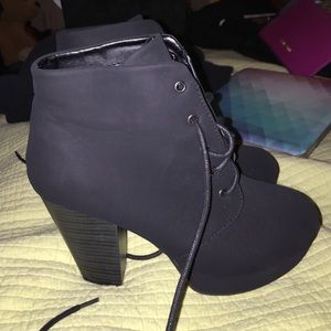Black high heeled boots