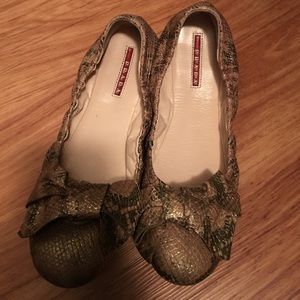 Gold snake skin print Prada flats