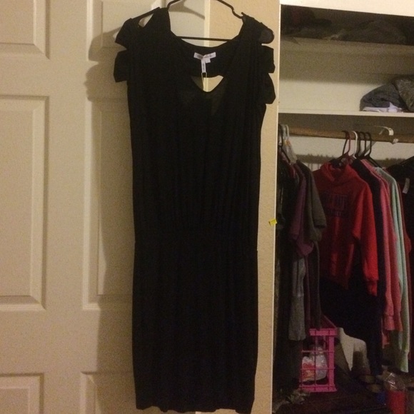 Large black flowy dress with cut off shoulders