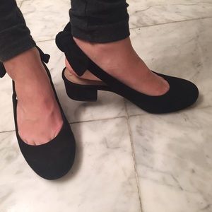 Black bow sling back heels