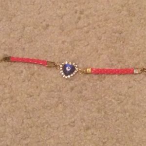 Evil eye bracelet with leather straps