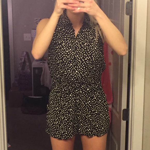 Navy and cream polka dot romper cut out back