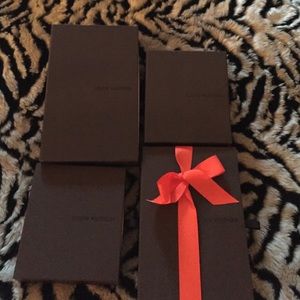 4 Louis Vuitton boxes