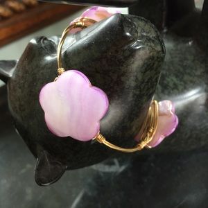 Lavender gold tone wire wrapped bangle.