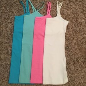 Sold as a set of 4! Tanks with built in shelf bra