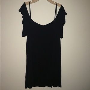 Black cold-shoulder dress.