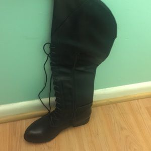 Over the knee black leather boots