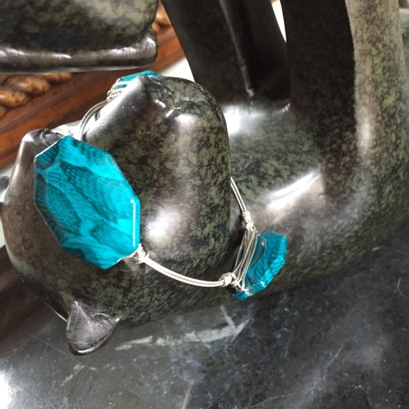 Silver tone acrylic wire wrapped bangle .