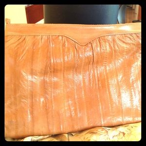 Buttery soft Genuine Eel Skin clutch