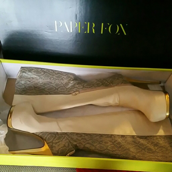 Beautiful gold trimmed high heeled boots!