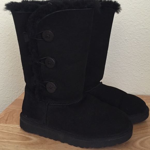 Black triple button UGGs