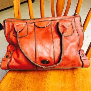 Well worn fossil handbag