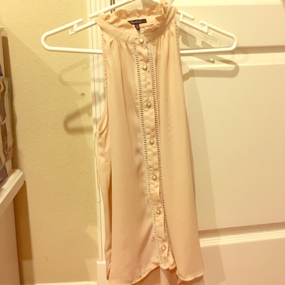 Cream sleeveless button up