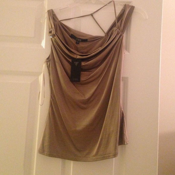 Assymetric GUESS top