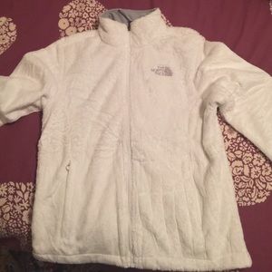 White furry north face jacket
